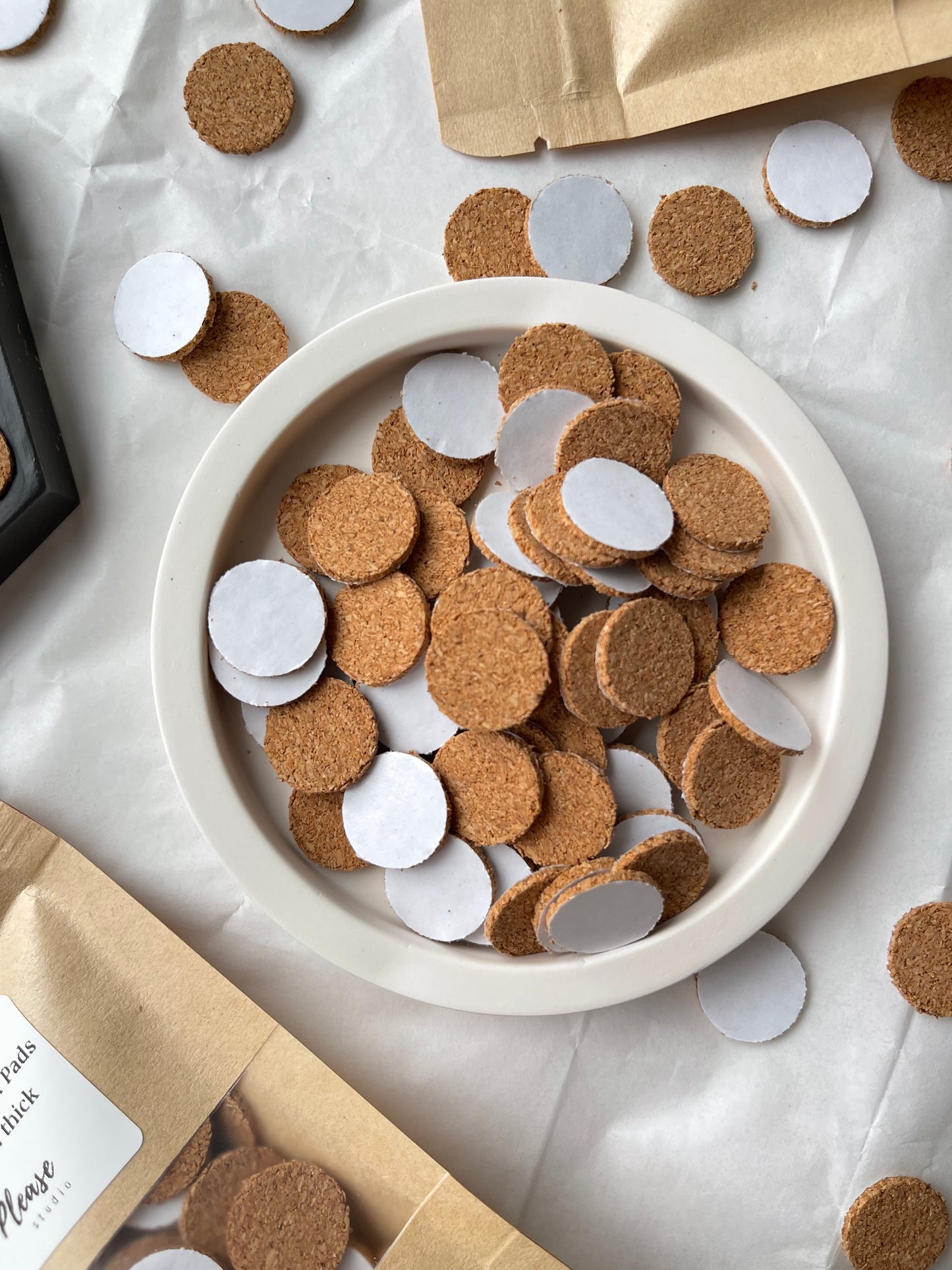 Self-adhesive round cork pads